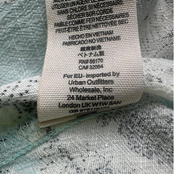 Soft and romantic wrap mini dress in a pale blue floral print by Free People - Picture 8 of 8